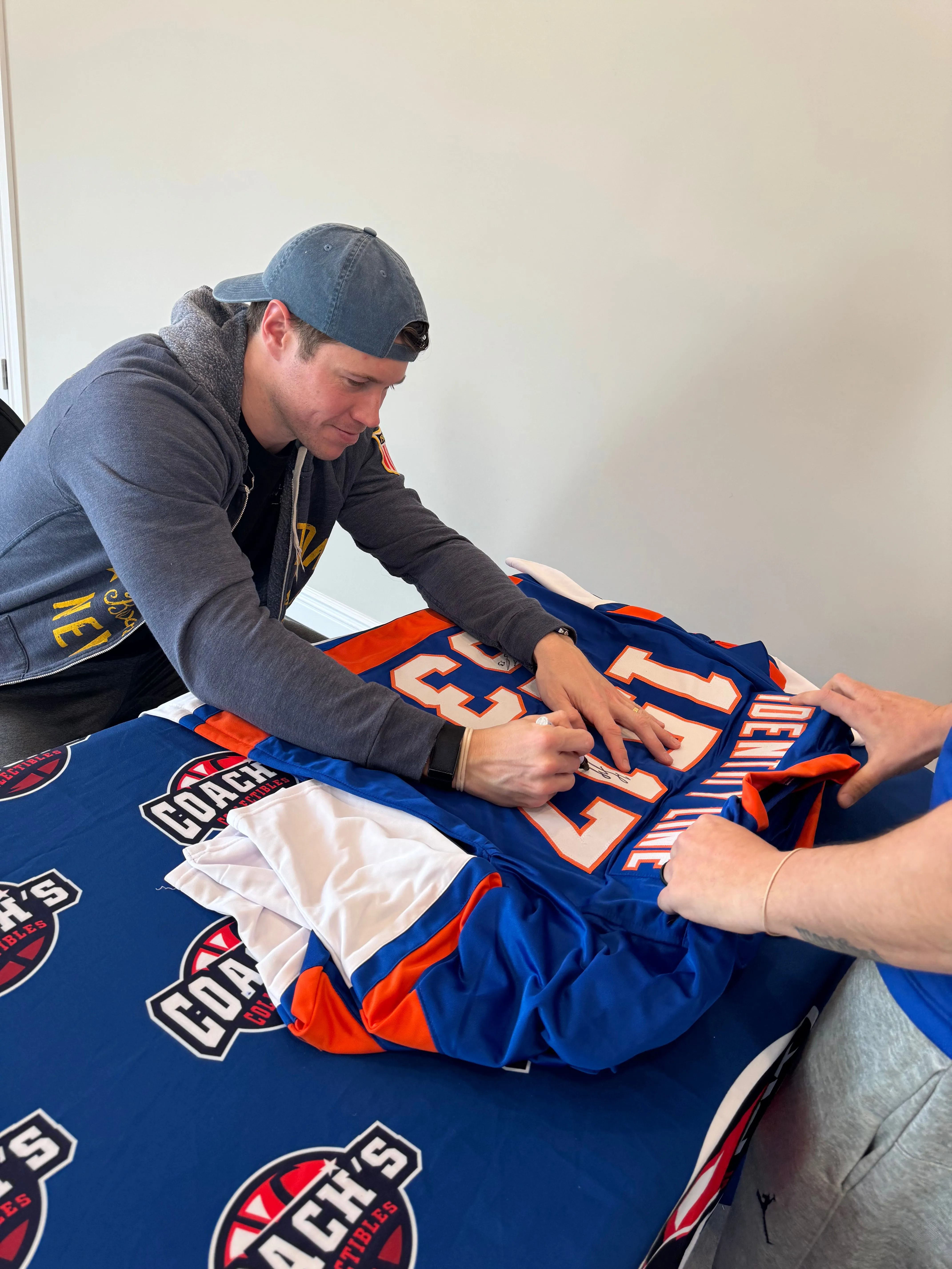 Cal Clutterbuck, Matt Martin & Casey Cizikas TRIPLE Autographed CUSTOM NY Islanders Identity Line Jersey (JSA)